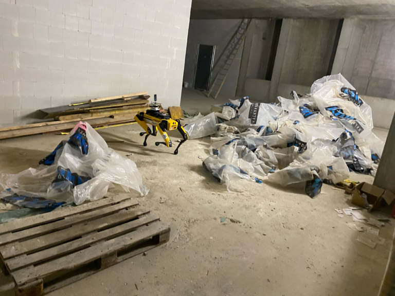 Boston Dynamics Spot is on a construction site with a Karelics payload